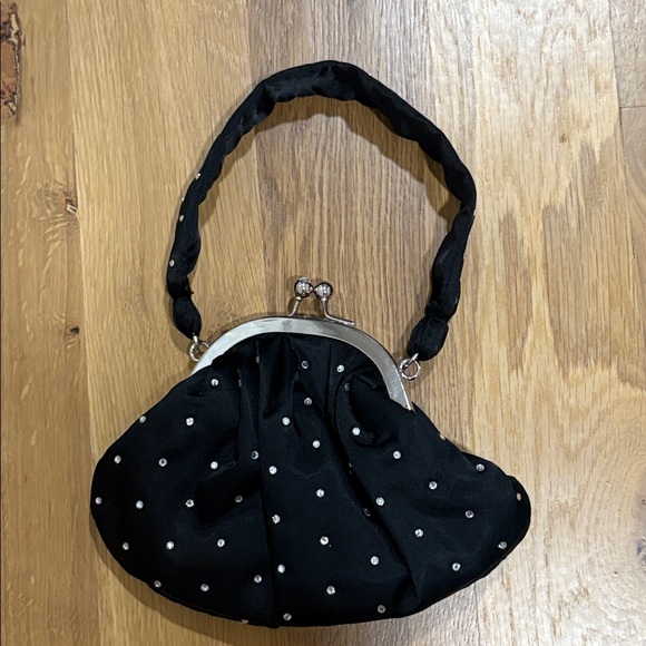 White House Black Market Handbags - White House Black Market Black Clutch with Silver Accents